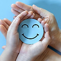 Hand-holding-paper-cut-circle-symbol-face-smile-happy-relax-satisfaction-survey-custom